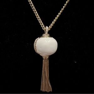 Long Goldtone Necklace with White Round Tassel Pendant